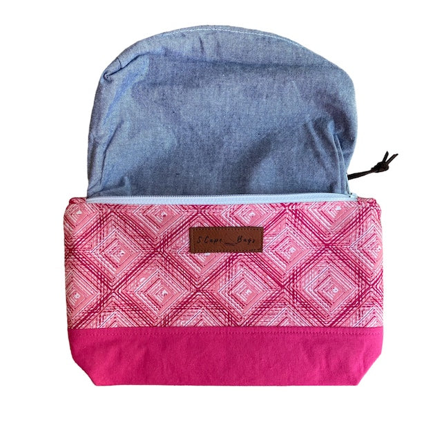 ssorted shades of pink geometric squares with blue chambray interior