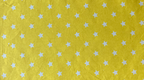 White stars on yellow print