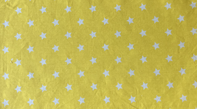 White stars on yellow print