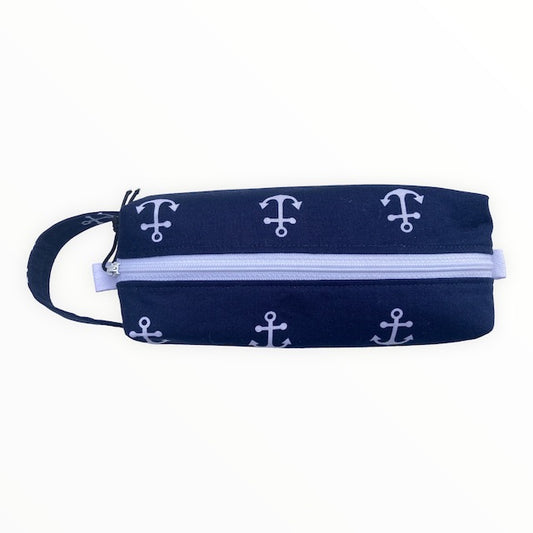 White anchors on a navy blue background